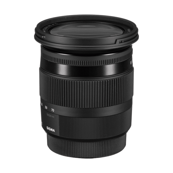 a black camera lens with a white background